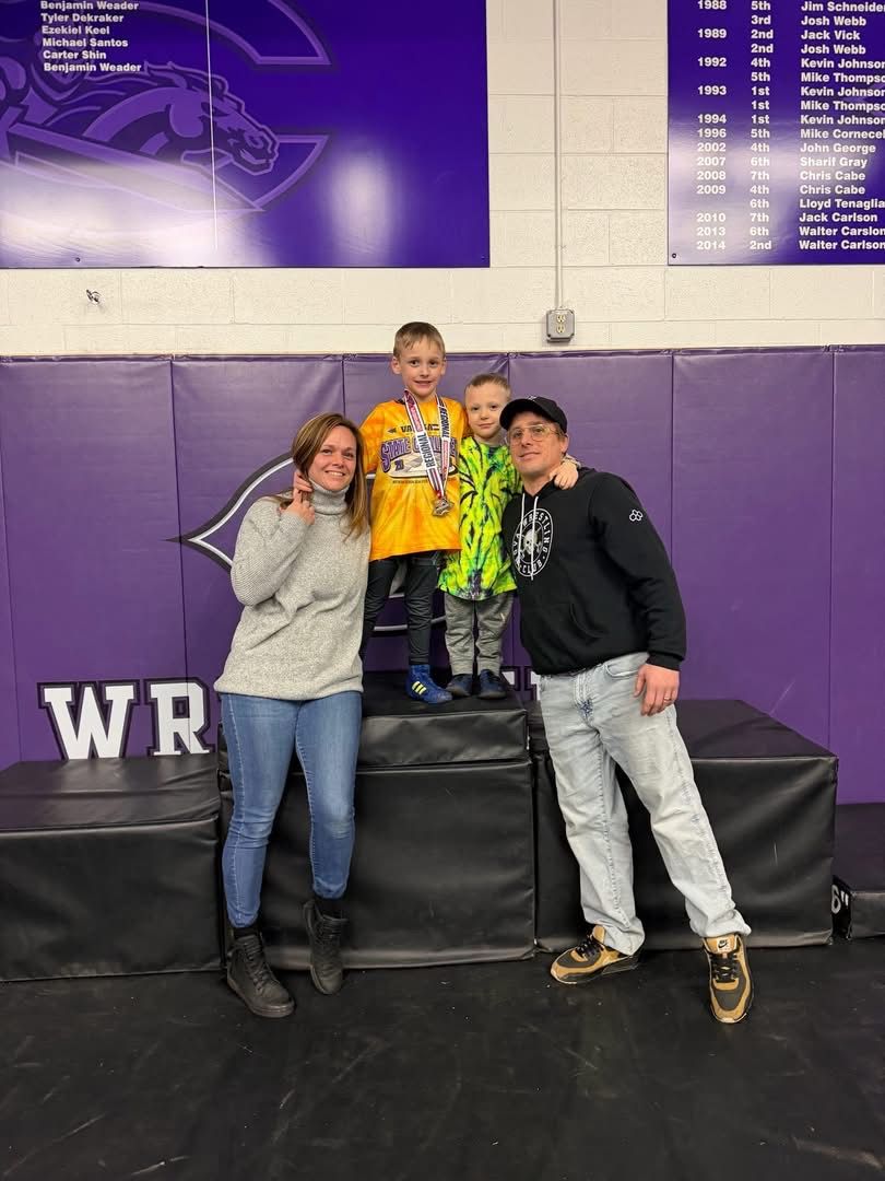 Kemmerer family — Virginia State Champion on the podium with Head Coach Joe Kemmerer